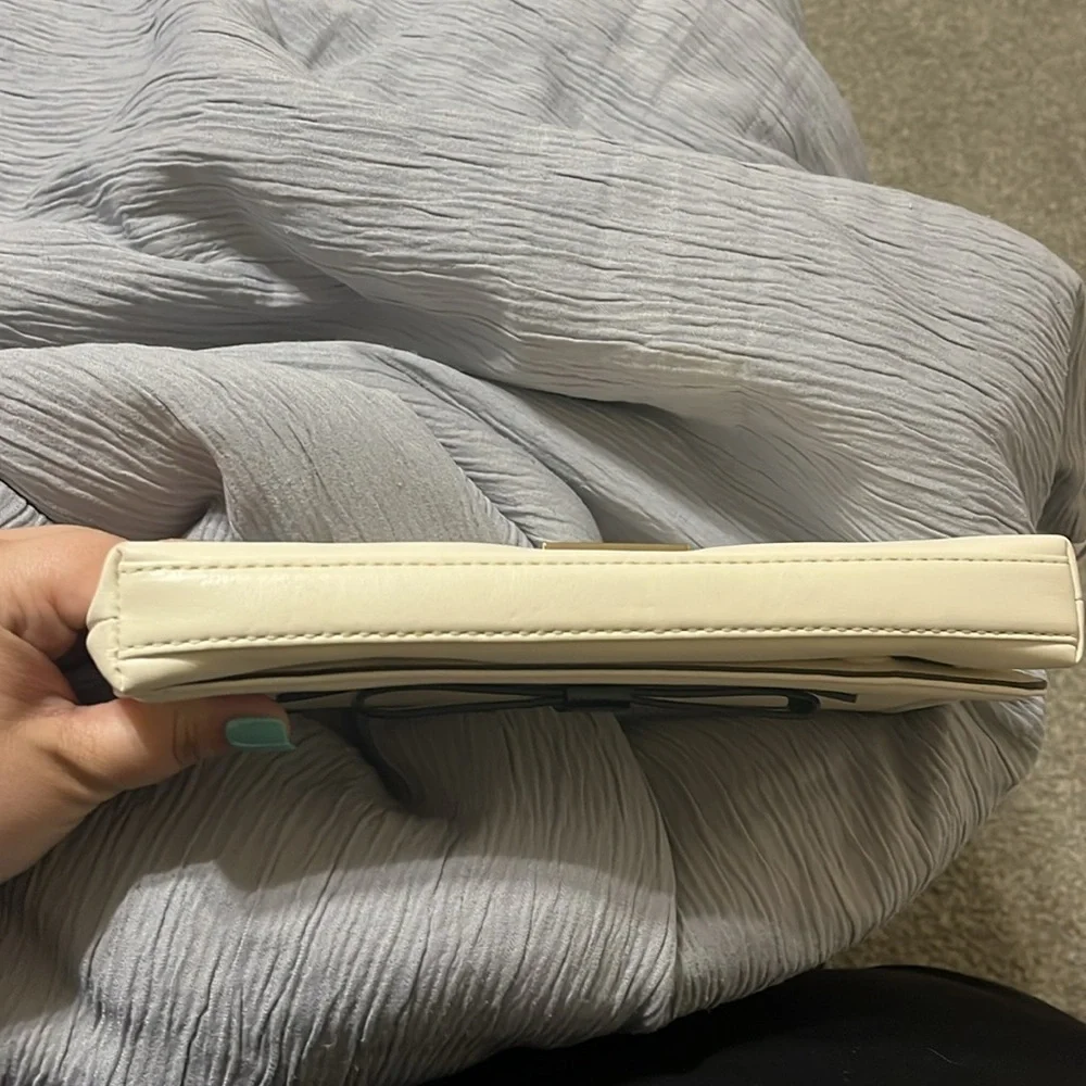 Kate Spade New York Cream Leather & Black Bow Tie Clutch